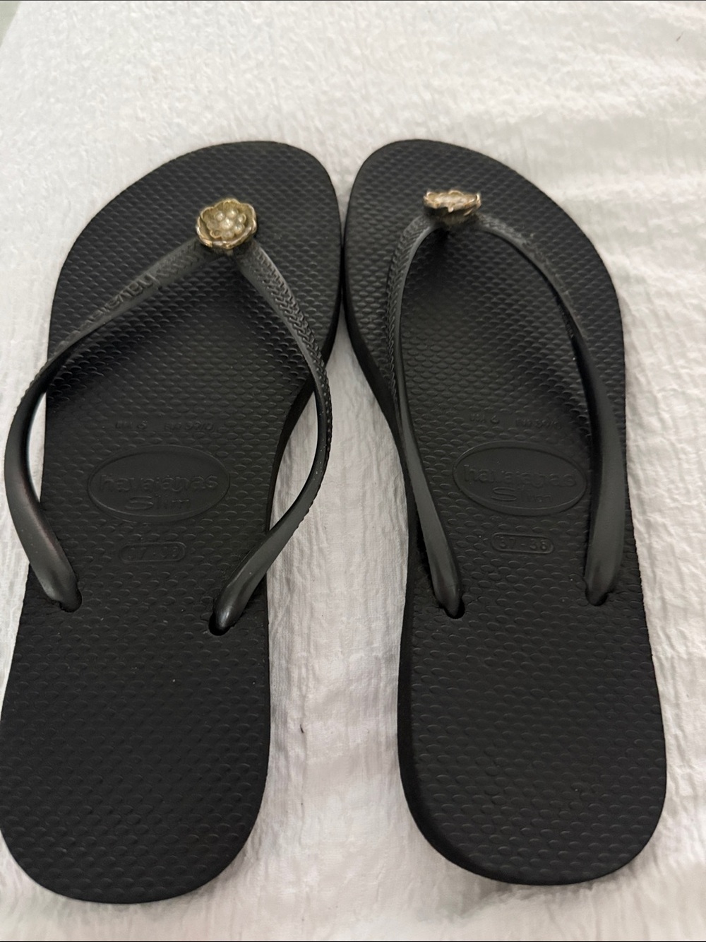 Havaianas Black slim Flip Flops with Gold Floral Charm - Women